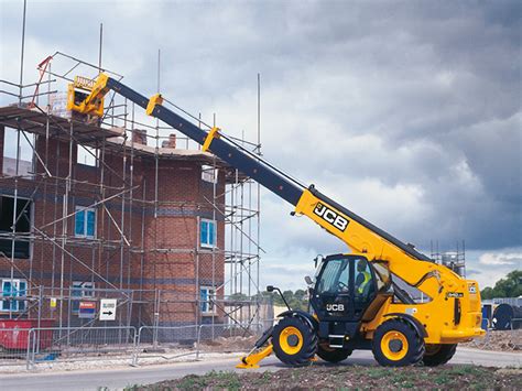 Telehandler operator lifting heavy materials