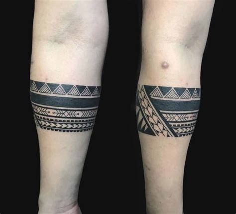 Tribal band tattoo around the calf