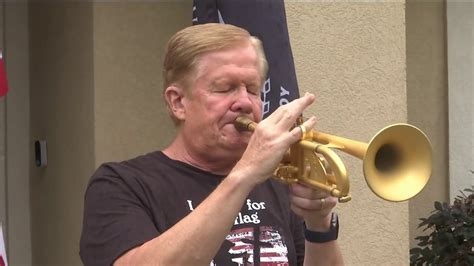 Trumpet player in a cemetery