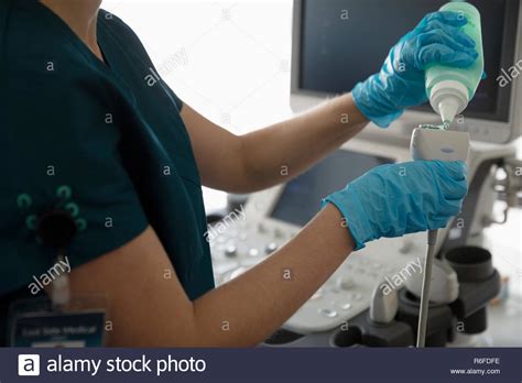 Ultrasound Technologist Preparing Patient for Procedure