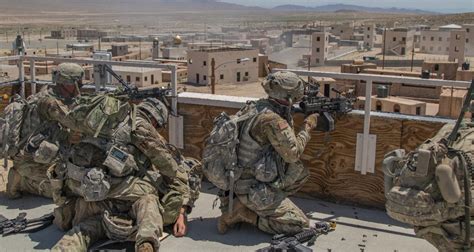 Army officers conducting urban warfare