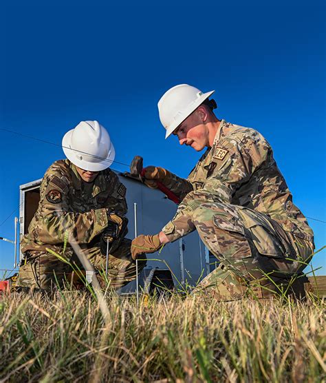 US Air Force Electrical Engineers in a meeting