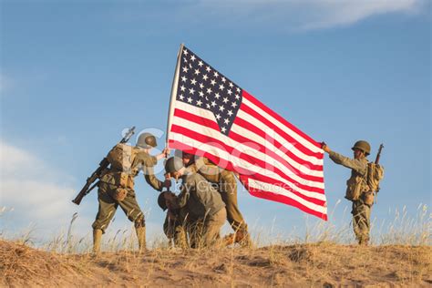 Soldier and the flag in the sunset