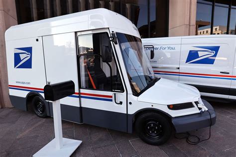 USPS Mail Carrier Delivering Mail