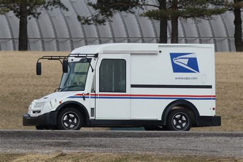 USPS Mail Carrier Working in Rain