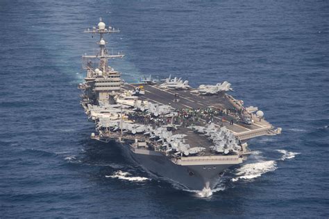 Aircraft taking off from the USS John C. Stennis