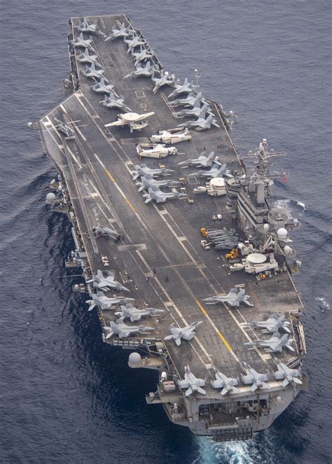 Aircraft taking off from the USS Theodore Roosevelt CVN-71