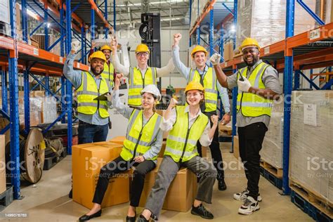 Warehouse workers working together