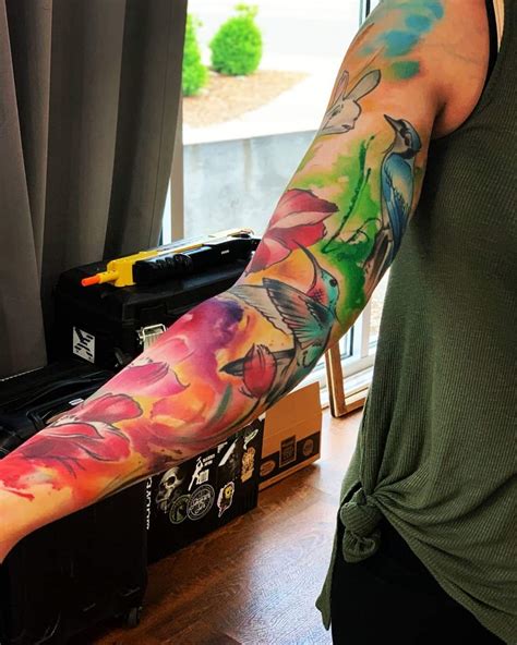 Watercolor Arm Sleeve Tattoos