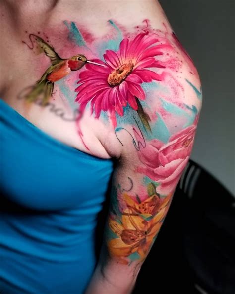 Watercolor half sleeve tattoo