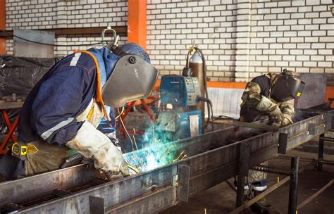 Welder at work in a factory